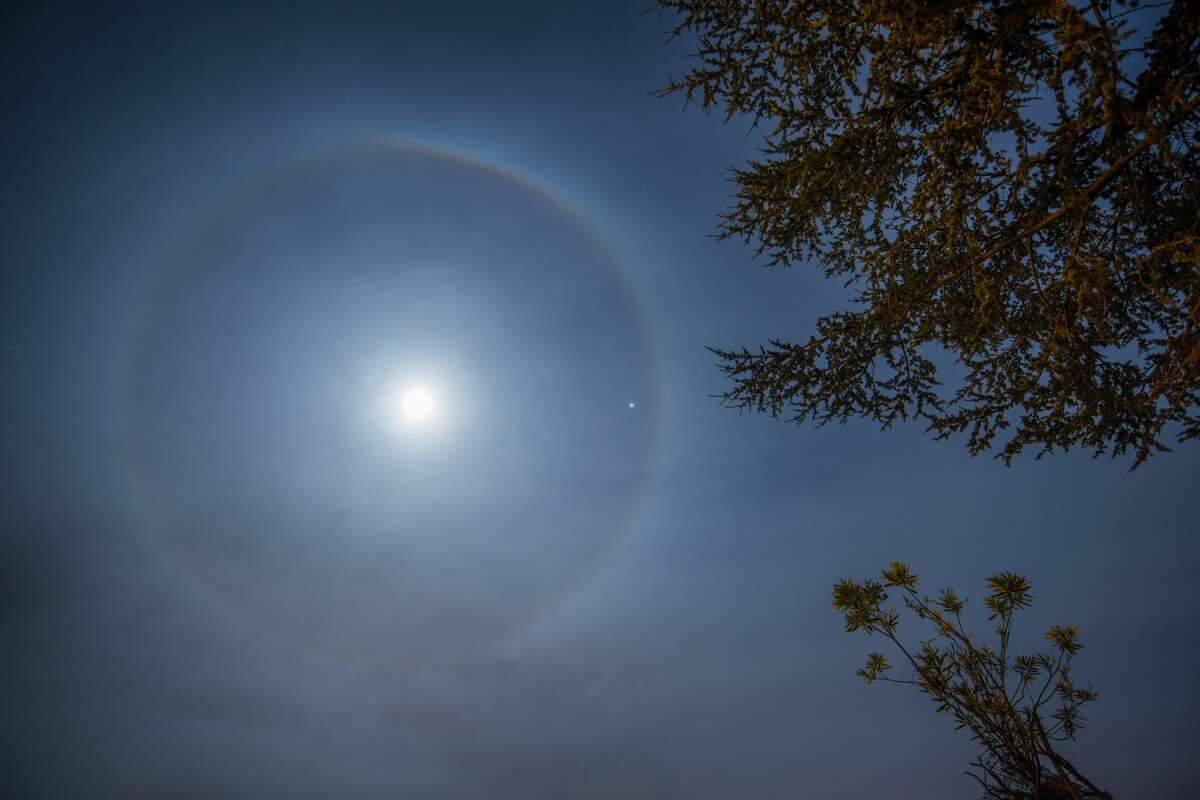 Have you seen a perfect halo around the moon recently? Here's why.