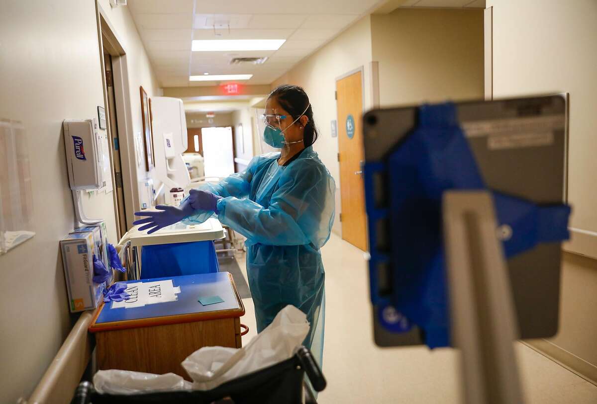 Nurse Janessa Deleon works in the COVID-19 ward of Regional Medical Center of San Jose, which has seen a surge of patients.