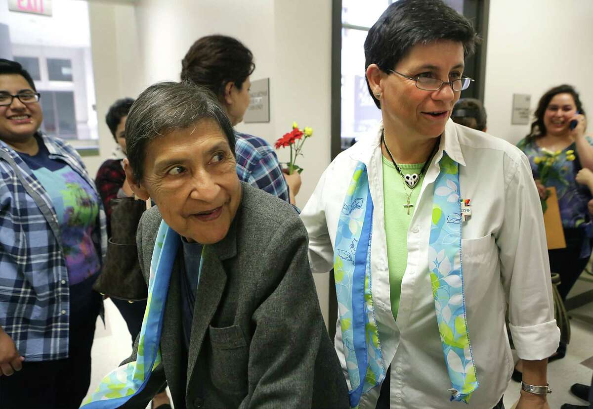 Nickie Valdez, left, and her partner, Deb Myers, were jubilant on the day they obtained a marriage license at the Bexar County Courthouse in June 2015. Valdez, a gay rights and social justice advocate who co-founded and led Dignity San Antonio, died Dec. 25, 2020 at 80 years old.