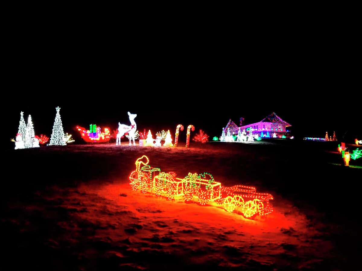 A train is one of the many lighted displays at Kevin and Connie Stevens' light display on Airport Road. (Colin Merry/Record Patriot)
