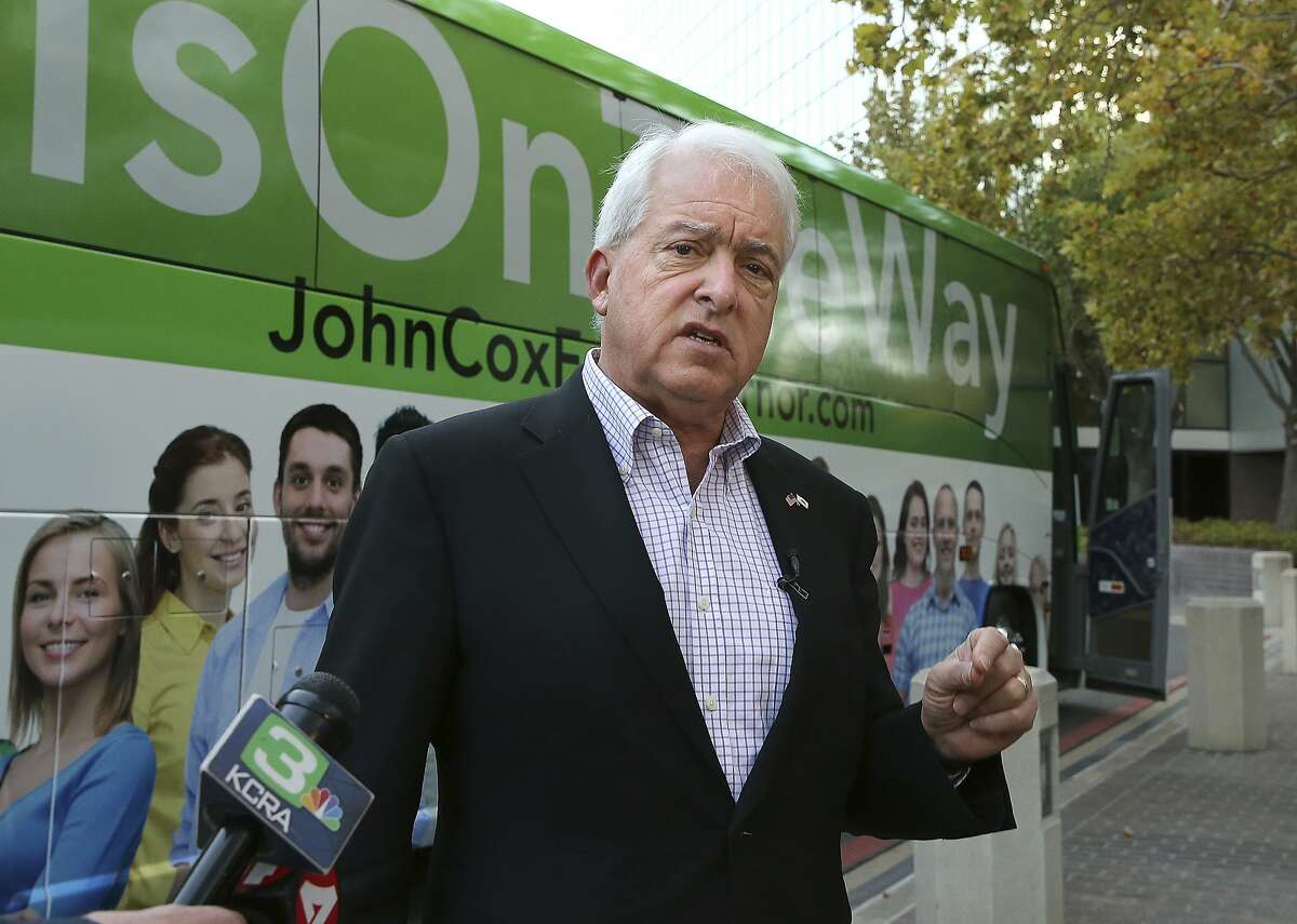 Republican gubernatorial candidate John Cox talks to reporters Nov. 1, 2018, before beginning a statewide bus tour in Sacramento, Calif.