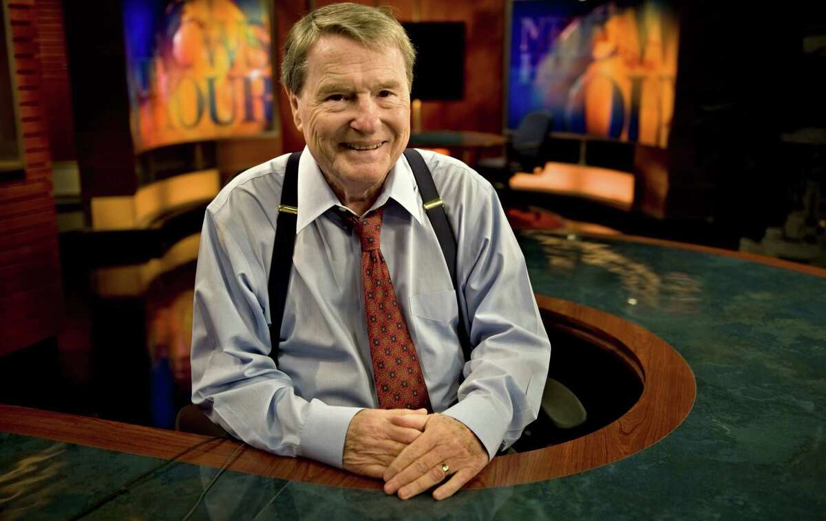 PBS news anchor Jim Lehrer poses for a portrait in his studio in Arlington, Virginia, in 2011.