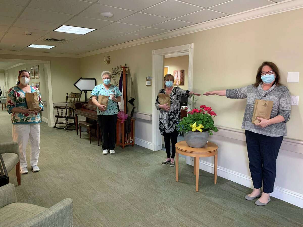 Staff and residents from Bishop Wicke Health and Rehabilitation Center in Shelton will receive the Covid-19 vaccination this week. Pictured, left to right, are staffers Beth Cairone, Evelyn Rupsis, Lori Bauer and Faith Wajdowicz.