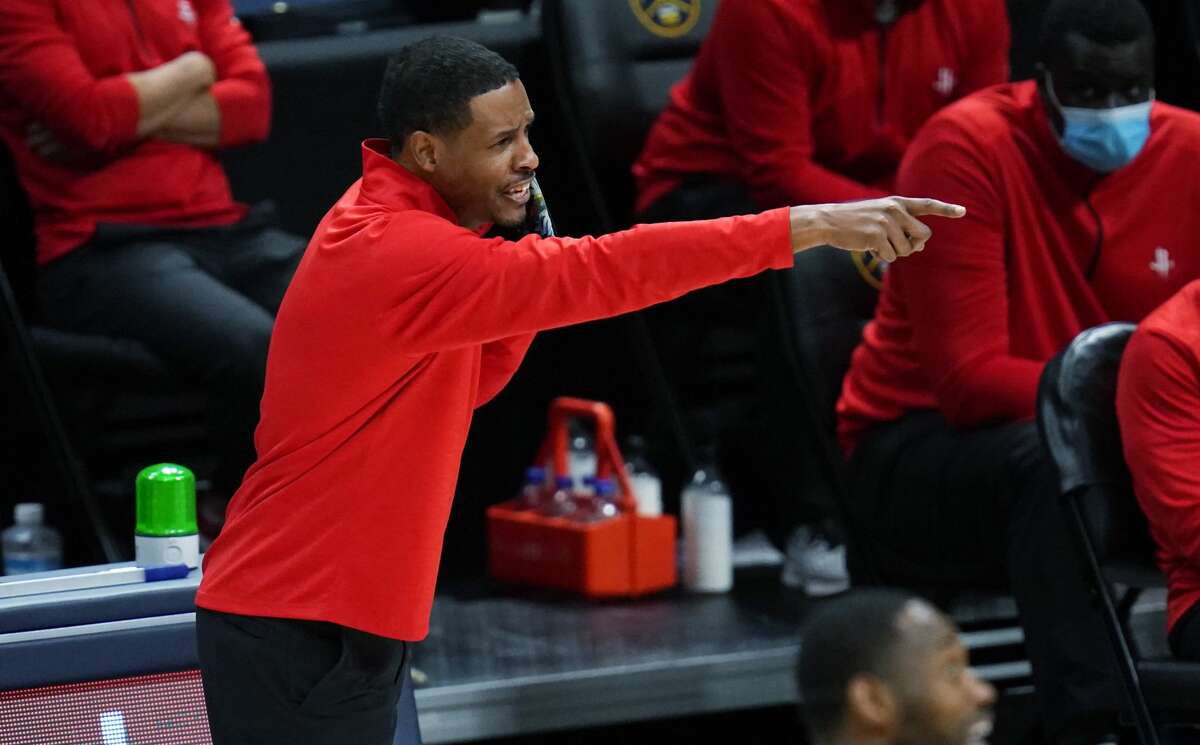 Houston Rockets coach Stephen Silas gestures during the second half of the team's NBA basketball game against the Denver Nuggets on Monday, Dec. 28, 2020, in Denver. (AP Photo/David Zalubowski)