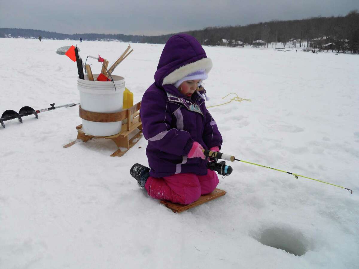 Katherine Beauchene, of Barkhamsted, waits to see if the fish are biting on West Hill Pond in Barkhamsted. “The rule of thumb is four inches of ice will hold several people. We suggest checking the thickness as you walk out (every 10 to 20 feet). If it’s thin, go back to where it was at least four inches.” (The DEEP has an ice safety page at https://bit.ly/38uiMc9.) As for places to try it out, Beauchene suggested such spots as Burr Pond State Park (Torrington), West Hill Pond (Barkhamsted), Coventry Lake (Coventry) and Tyler Lake (Goshen). There’s also a bunch of popular state-owned areas with public access listed here: https://bit.ly/37TPc0q. For example, in western Connecticut there’s Squantz Pond in New Fairfield and Mount Tom Pond in Washington. In central Connecticut, there’s Batterson Park Pond in New Britain and Moodus Reservoir in East Haddam. Options toward the east include Bigelow Pond in Union and Mansfield Hollow Reservoir in Mansfield.