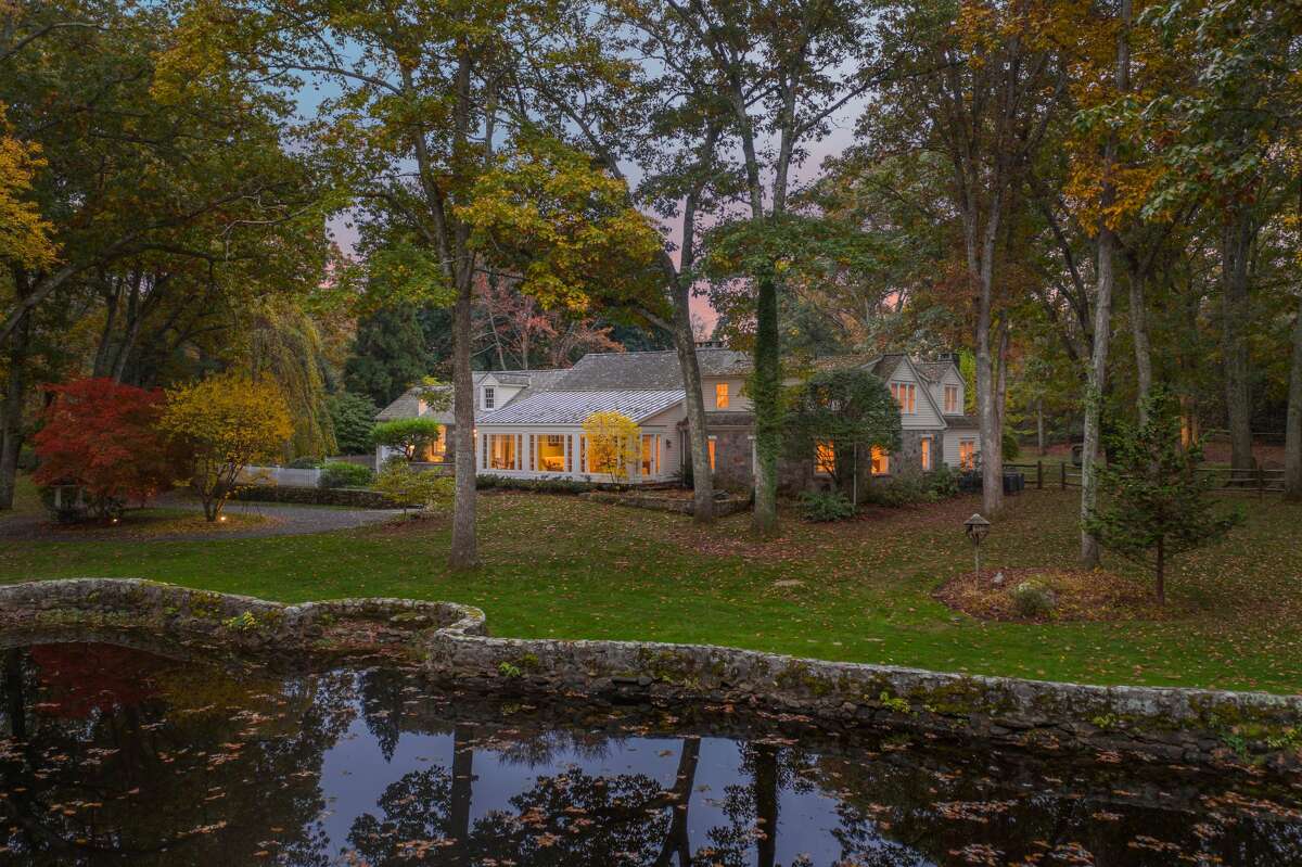 From this property at 232 Newtown Turnpike, Weston residents can canoe to a large pond.