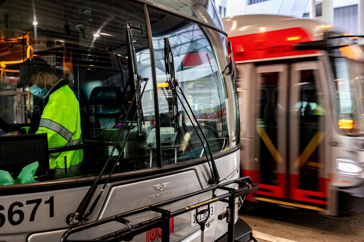 A Muni operator checks the bus before departing from the Salesforce Transit Center.