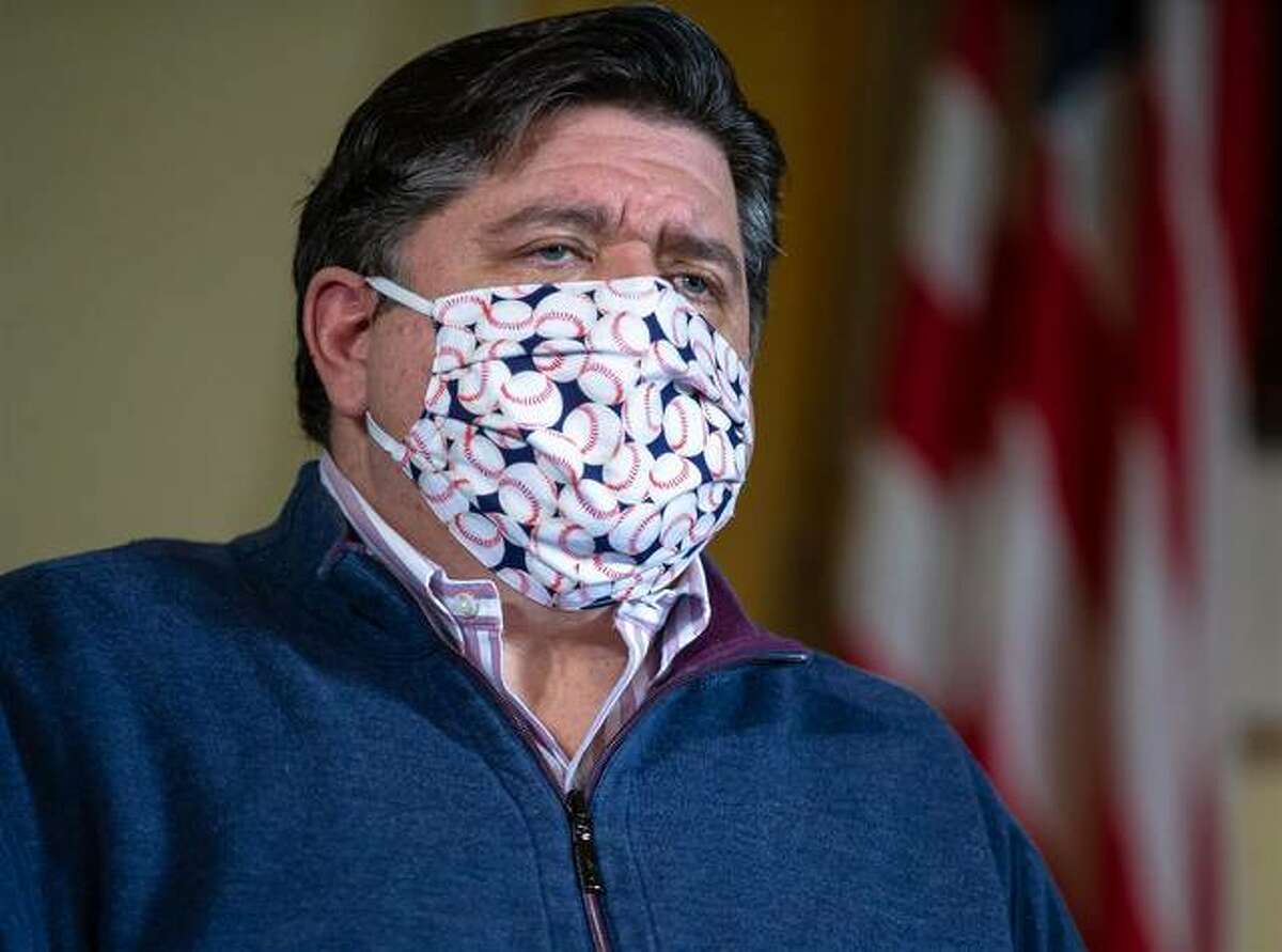 FILE - Gov. J.B. Pritzker faces a number of questions from news media throughout the state May 21 on issues ranging from youth sports activities to worship services. He gave his daily COVID-19 press briefing from his office at the Capitol in Springfield.