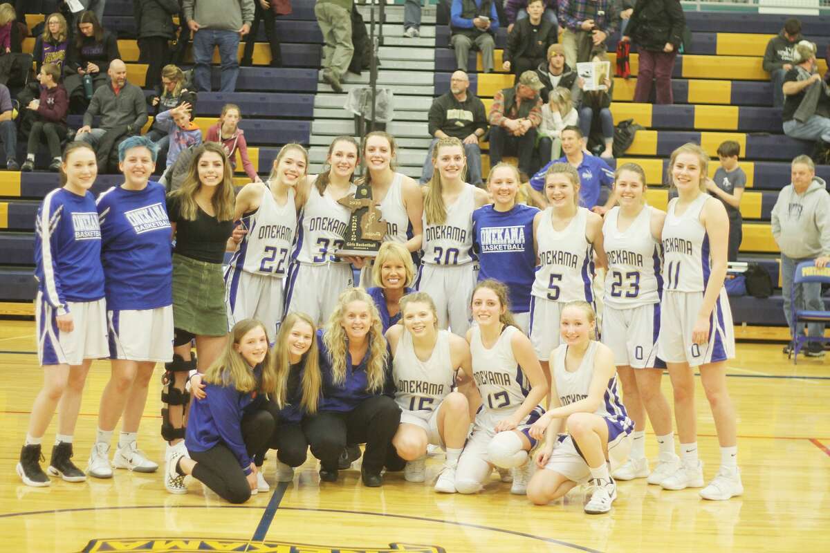 The Onekama girls basketball team won a Division 4 district championship on March 6 with a win over rival Frankfort.