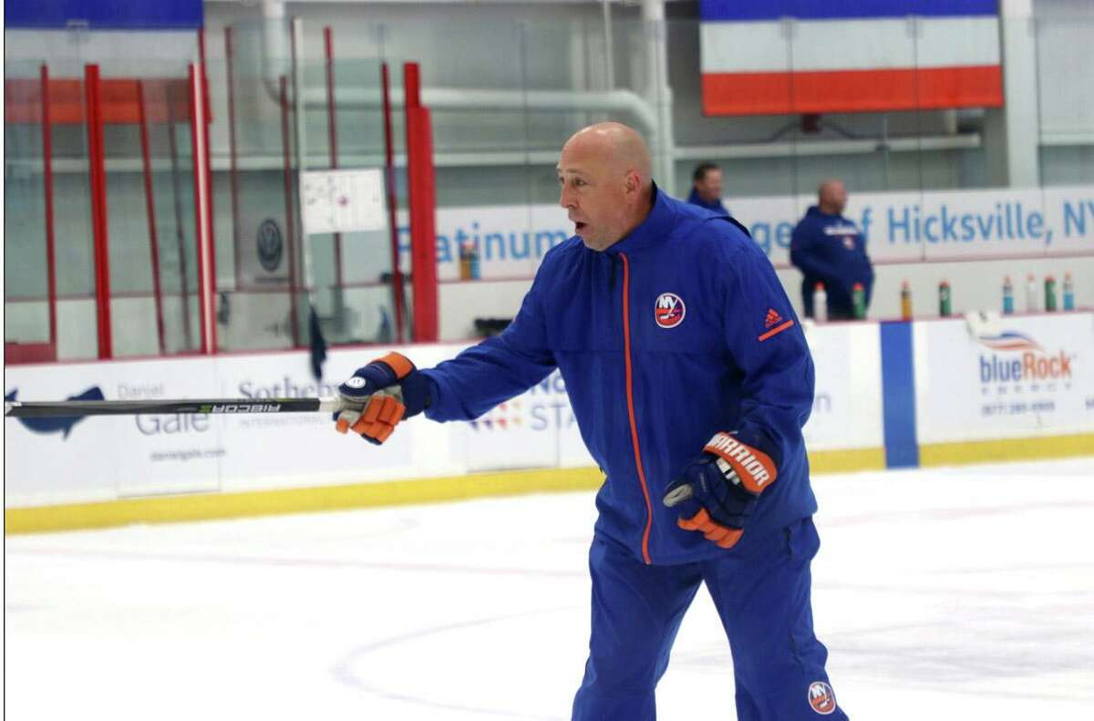 Bridgeport Sound Tigers coach Brent Thompson runs an Islanders minicamp practice at Northwell Health Ice Center in East Meadow, N.Y. in 2018.