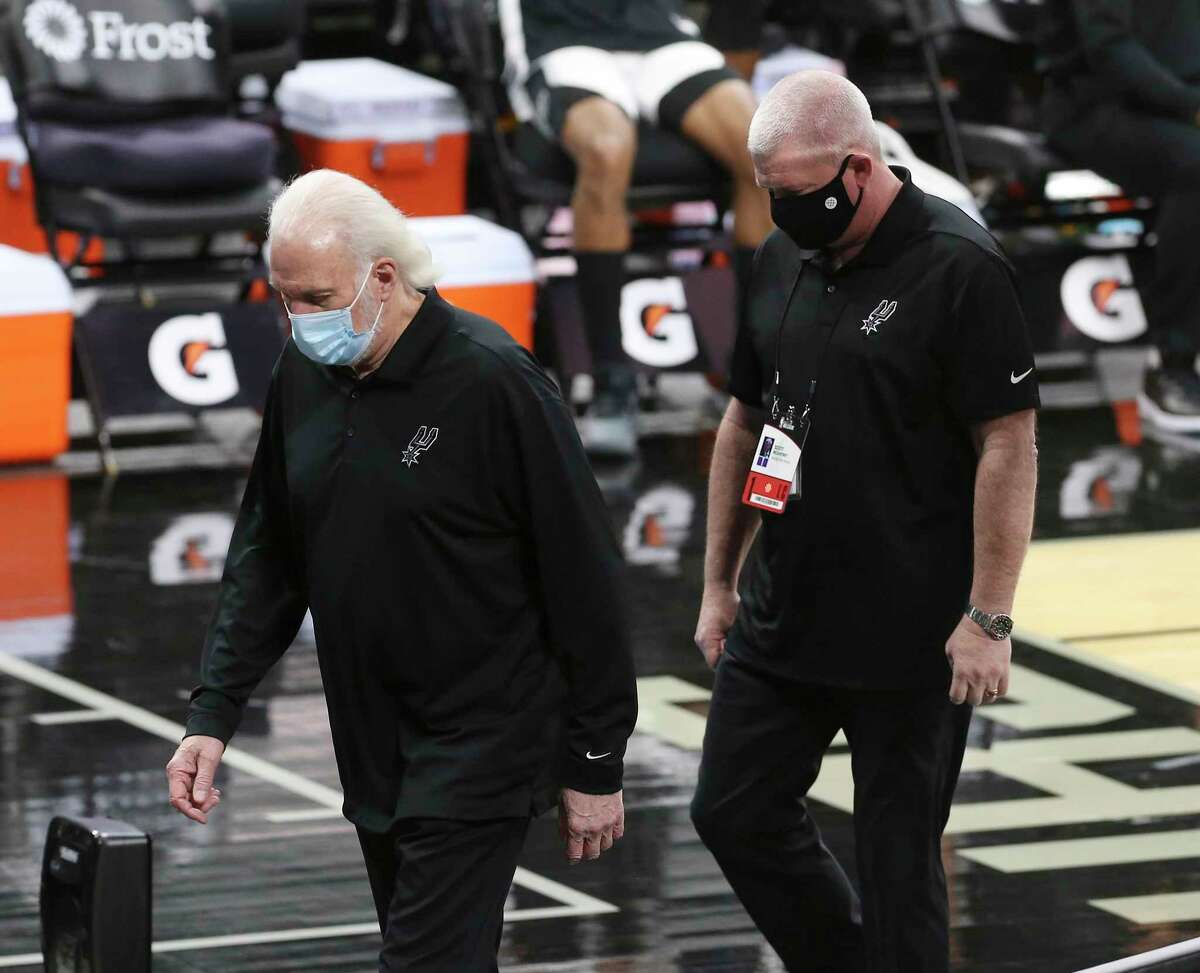 Spurs’ coach Gregg Popovich walks off the court after getting ejected by game official during the game against the Los Angeles Lakers at the AT&T Center on Wednesday, Dec. 30, 2020.