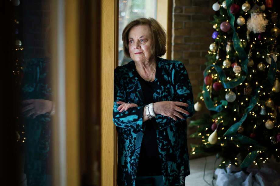 Sharon Miller, 73, who has recovered from a case of COVID-19, poses for a portrait Wednesday in Midland. (Katy Kildee/kkildee@mdn.net)