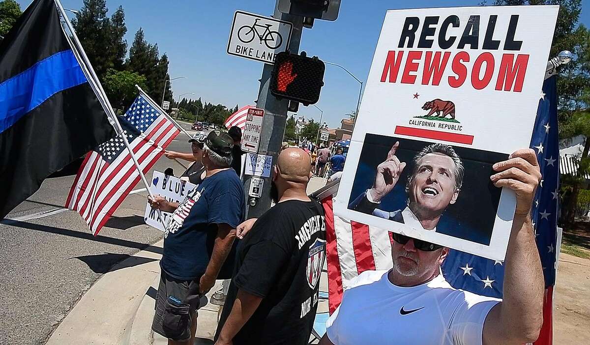 Opponents of Gov. Gavin Newsom at a July 18 rally in Fresno.