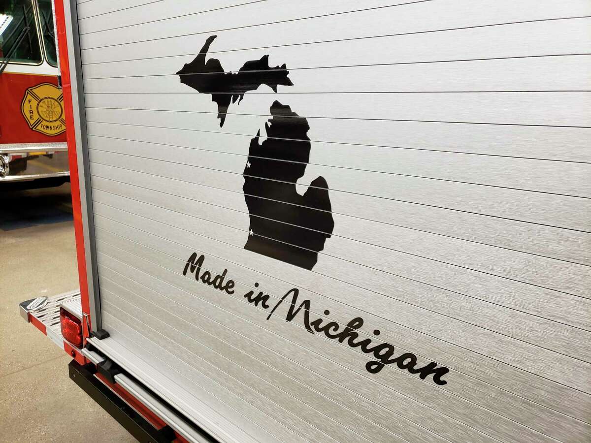 The new Manistee Township Fire Department truck features a logo of Michigan with two stars on it. One star marks its home in Manistee and the other marks where it was built. (Arielle Breen/news Advocate)