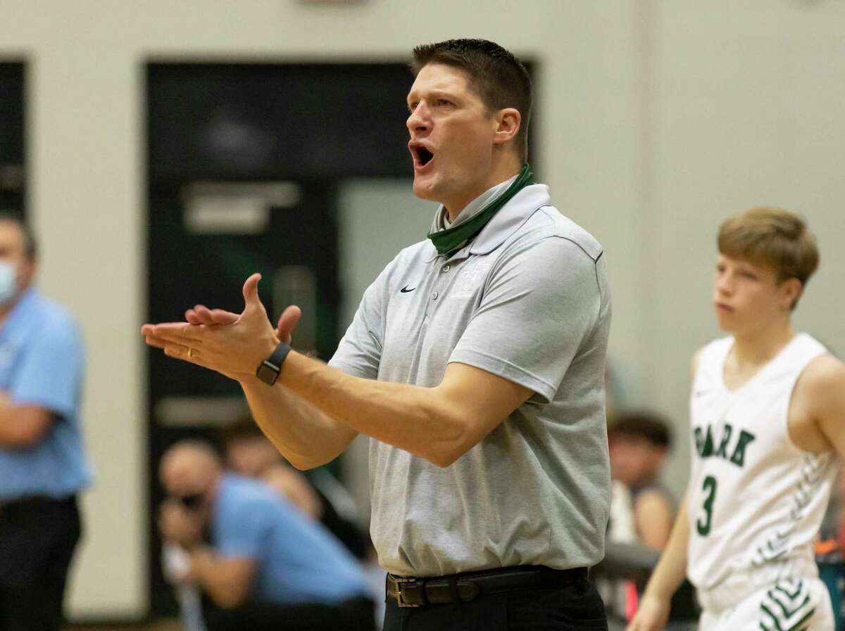 Kingwood Park head coach Jeff Hamilton reacts after his team fails to score during the third period of a non-district basketball game against Sam Rayburn at Kingwood Park High School, Wednesday, Dec. 30, 2020, in Kingwood.