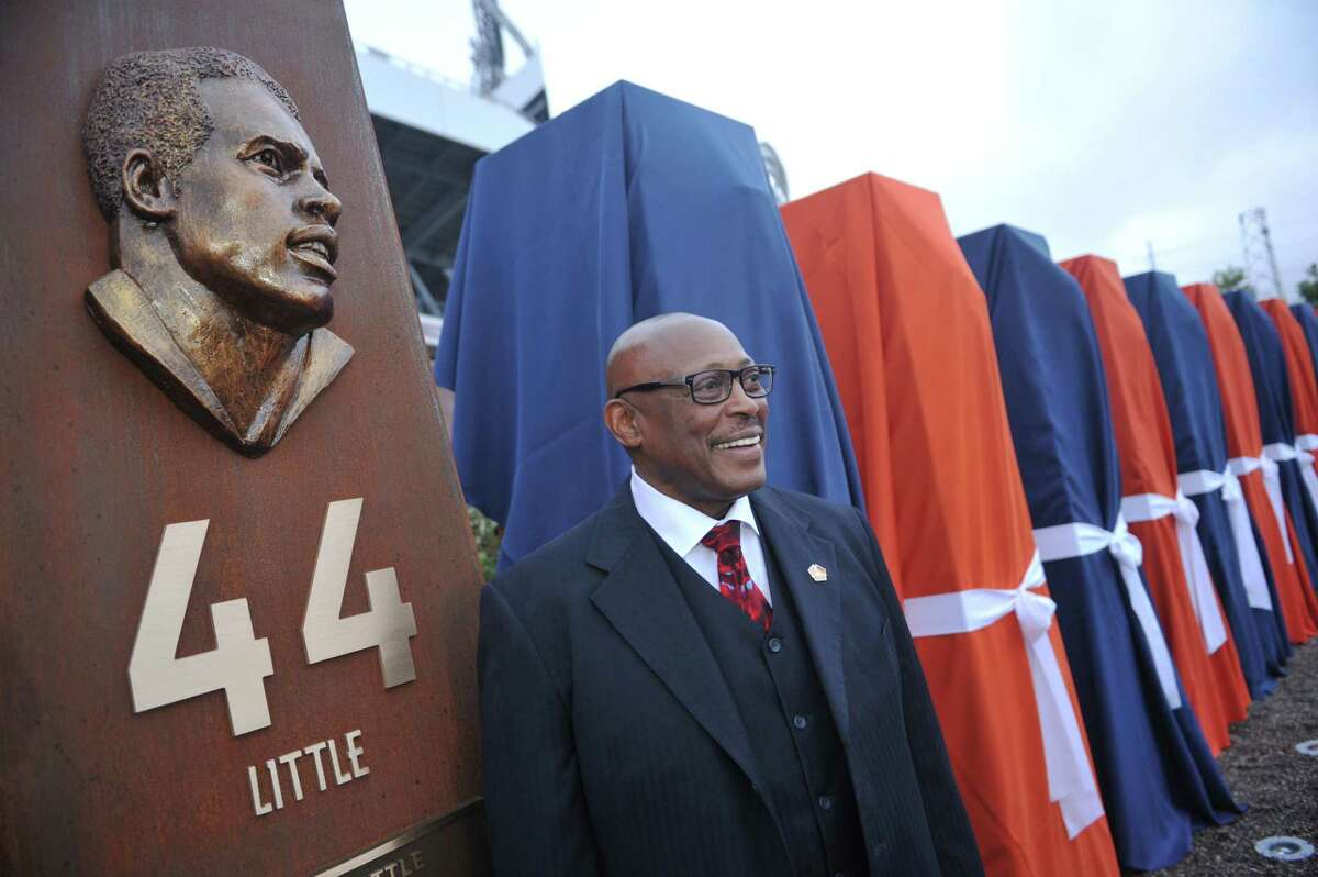 DENVER, CO - September 27 : Pro Football Hall of Fame running back Floyd Little unveiled the sculpture at the Denver Broncos Ring of Fame Plaza in Sports Authority Field at Mile High. Denver, Colorado. September 27, 2013. The Plaza feature pillars honoring each of the 24 players in the Broncos Ring of Fame. (Photo by Hyoung Chang/The Denver Post via Getty Images)