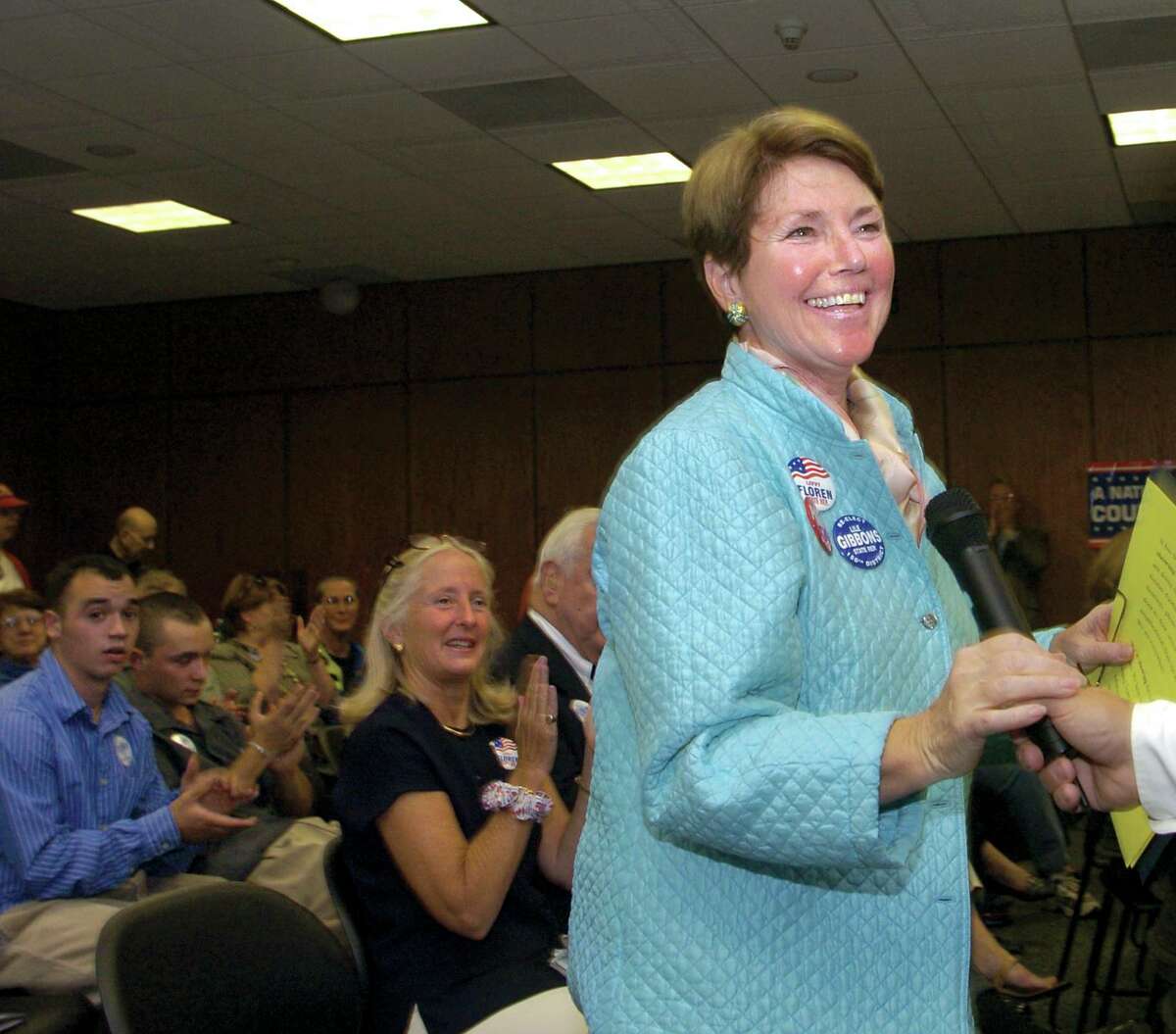 Livvy Floren gets a round of applause as she is introduced to the crowd gathered for the the Republican Town Committee campaign kickoff at Greenwich Town Hall in 2004