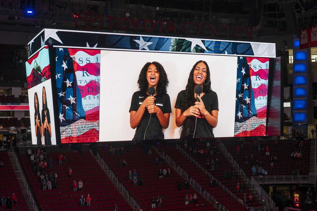 In a recording, Rockets head coach Stephen Silas' daughters, Ky and Kae, sing the National Anthem before the Houston Rockets 102-94 win over the Sacramento Kings on Saturday, Jan. 2, 2021, at Toyota Center in Houston.