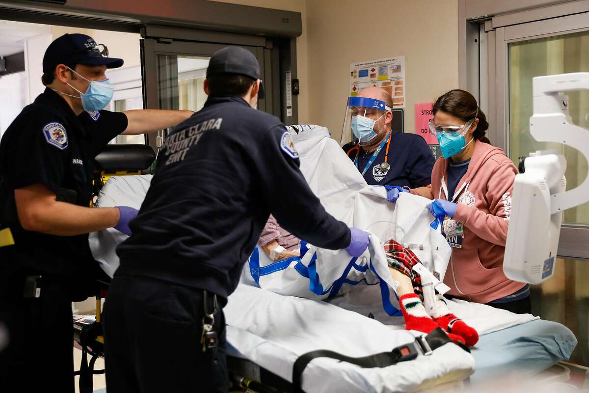 Emergency room personnel attend to a stroke patient who was rushed to the hospital at Regional Medical Center of San Jose, an acute-care hospital, on Tuesday, Dec. 8, 2020 in San Jose, California. The Biden administration blocked former President Donald Trump’s potential rollback of thousands of federal health regulations in response to a suit led by Santa Clara County.