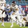MIAMI GARDENS, FLORIDA - JANUARY 02: Kellen Mond #11 of the Texas A&M Aggies runs with the ball against the North Carolina Tar Heels during the first half of the Capital One Orange Bowl at Hard Rock Stadium on January 02, 2021 in Miami Gardens, Florida. (Photo by Michael Reaves/Getty Images)