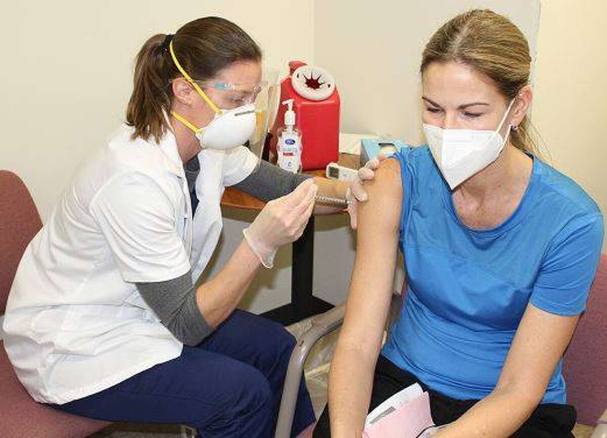 Battling the virus More shots as deaths continue