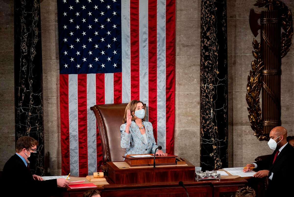 Speaker of the House Nancy Pelosi is sworn in on the House floor in the Capitol after winning another term, which could be her last. Pelosi narrowly defeated House GOP leader Kevin McCarthy of Bakersfield.