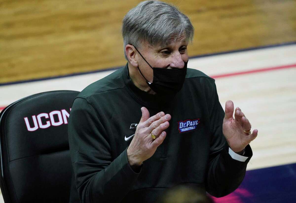 DePaul coach Doug Bruno talks to his team on the sideline during the second half against Connecticut in an NCAA college basketball game Tuesday, Dec. 29, 2020, in Storrs, Conn. (David Butler II/Pool Photo via AP)