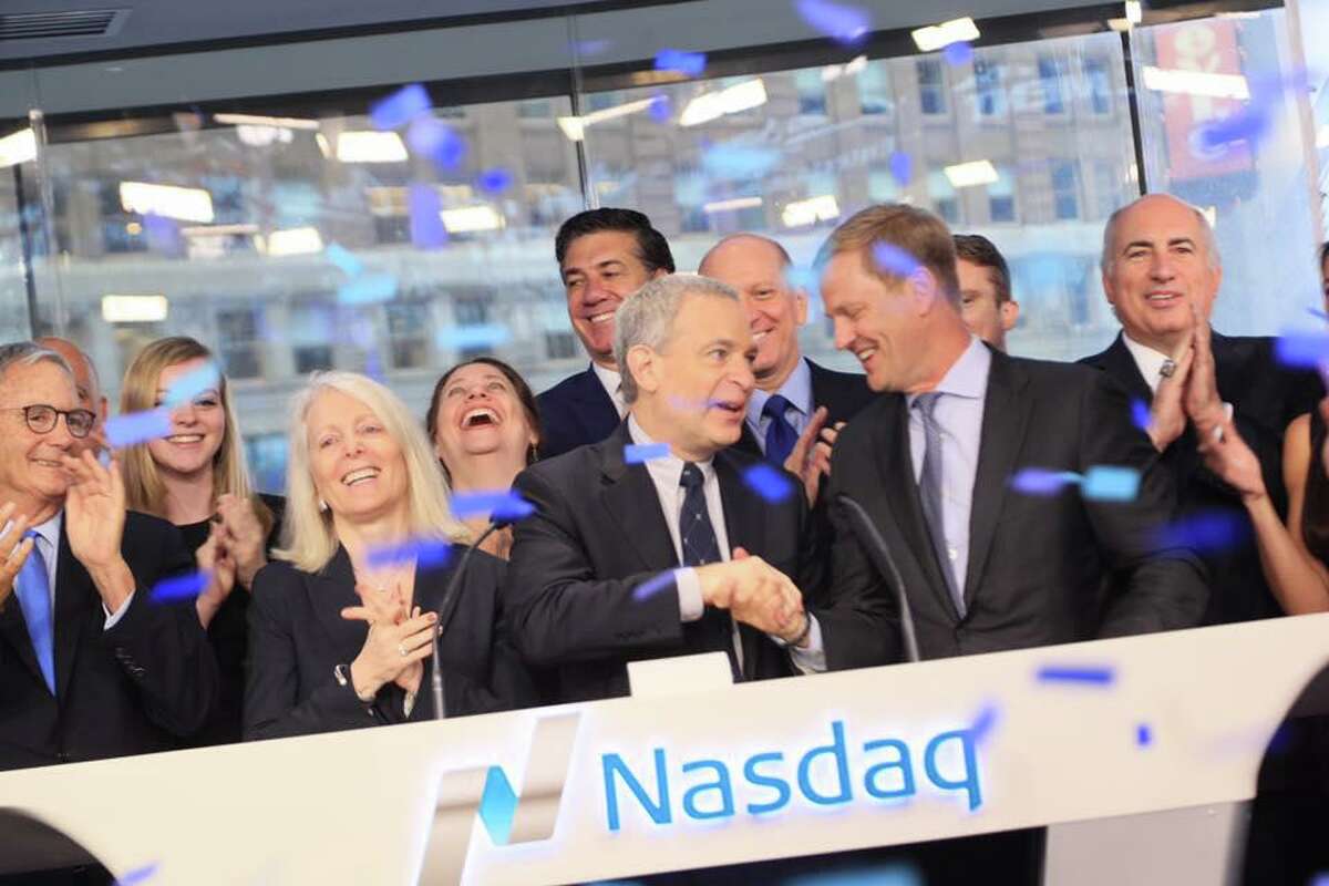 Chicken Soup for the Soul Entertainment CEO Bill Rouhana Jr., center, on Friday, Aug. 18, 2017, during a Nasdaq market opening ceremony recognizing the Greenwich, Conn.-based company's initial public offering of stock.