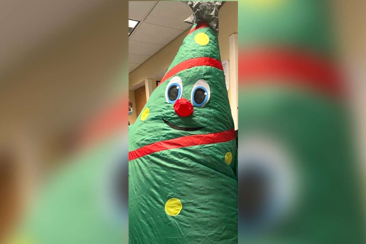 NBC Bay Area obtained an image of an air-powered, inflatable Christmas tree costume, worn briefly by an employee on Christmas, is suspected to be the source of a COVID-19 outbreak at Kaiser Permanente Medical Center in San Jose.