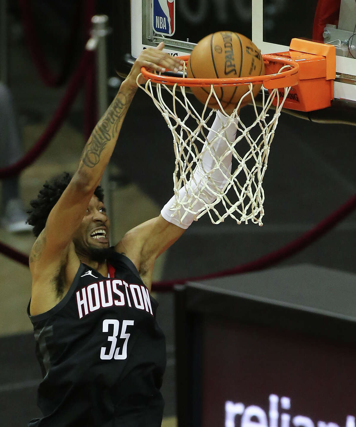 Houston Rockets forward Christian Wood (35) dunks the ball with a relay from James Harden during the third quarter of a NBA game against the Dallas Mavericks Monday, Jan. 4, 2021, at Toyota Center in Houston.