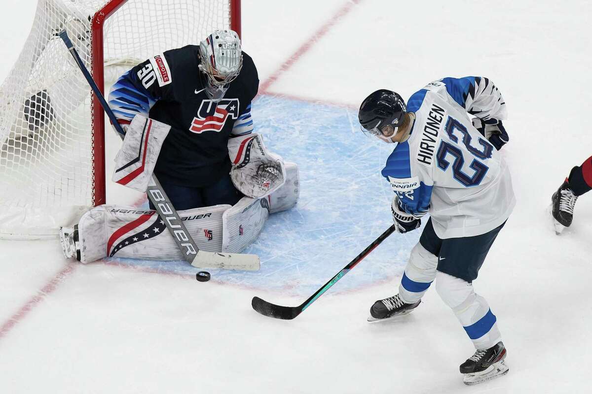 EDMONTON, AB - JANUARY 04: Goaltender Spencer Knight #30 of the United States makes a save against Roni Hirvonen #22 of Finland during the 2021 IIHF World Junior Championship semifinals at Rogers Place on January 4, 2021 in Edmonton, Canada. (Photo by Codie McLachlan/Getty Images)