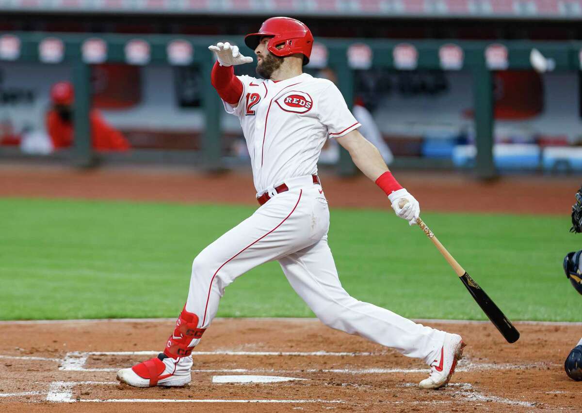 CINCINNATI, OH - SEPTEMBER 22: Curt Casali #12 of the Cincinnati Reds bats during the game against the Milwaukee Brewers at Great American Ball Park on September 22, 2020 in Cincinnati, Ohio. (Photo by Michael Hickey/Getty Images)