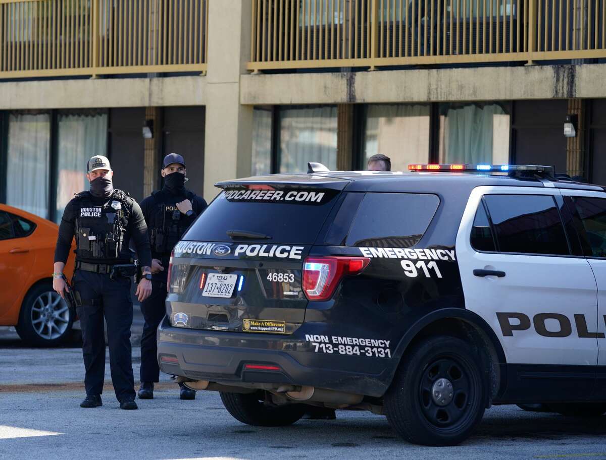 Police are shown at the scene of an officer involved shooting at the North Villa Inn, 16510 North Freeway, Tuesday, Jan. 5, 2021 in Houston.