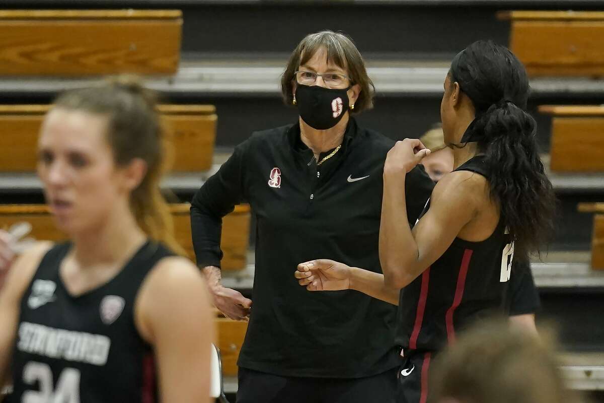 Stanford head coach Tara VanDerveer talks with guard Kiana Williams during a break in the action against Pacific in the first half of an NCAA college basketball game in Stockton , Calif., Tuesday, Dec. 15, 2020. Stanford's 104-61 win over Pacific, made VanDerveer the winningest women's basketball coach in history with 1,099 victory's breaking the previous record set by Pat Summitt.