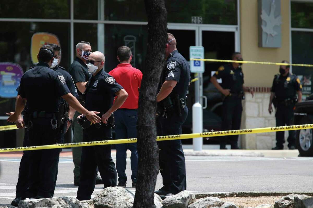 San Antonio police investigate a homicide at Diesel Barbershop in the 11300 block of Bandera Road on May 6, 2020. According to San Antonio Police Chief William McManus, a male in his 30s is believed to have shot a woman, who died at the shop. He also is suspected of stabbing a second woman who was transported to a local hospital.