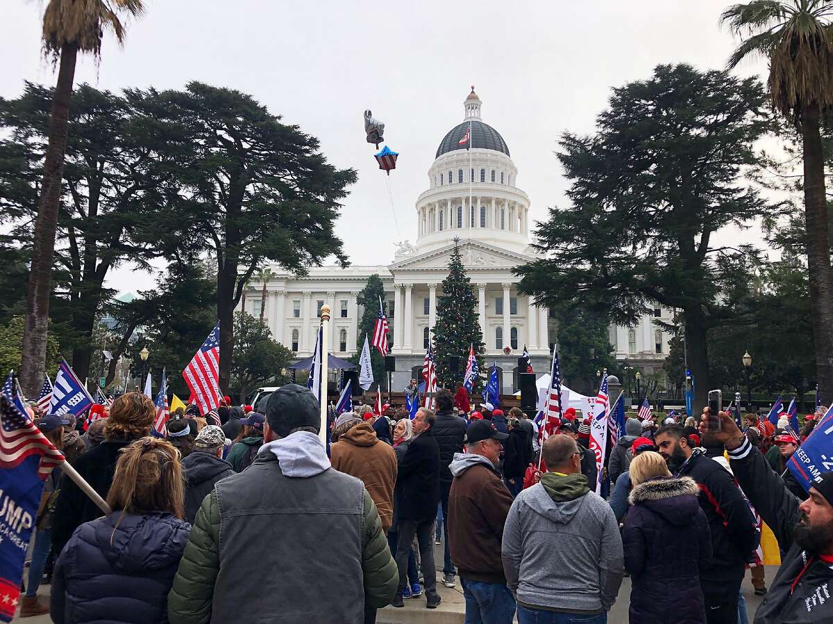 Hundreds of pro-Trump demonstrators gather outside the California Capitol in Sacramento, objecting to the certification of election results and calling for the recall of Gov. Gavin Newsom.