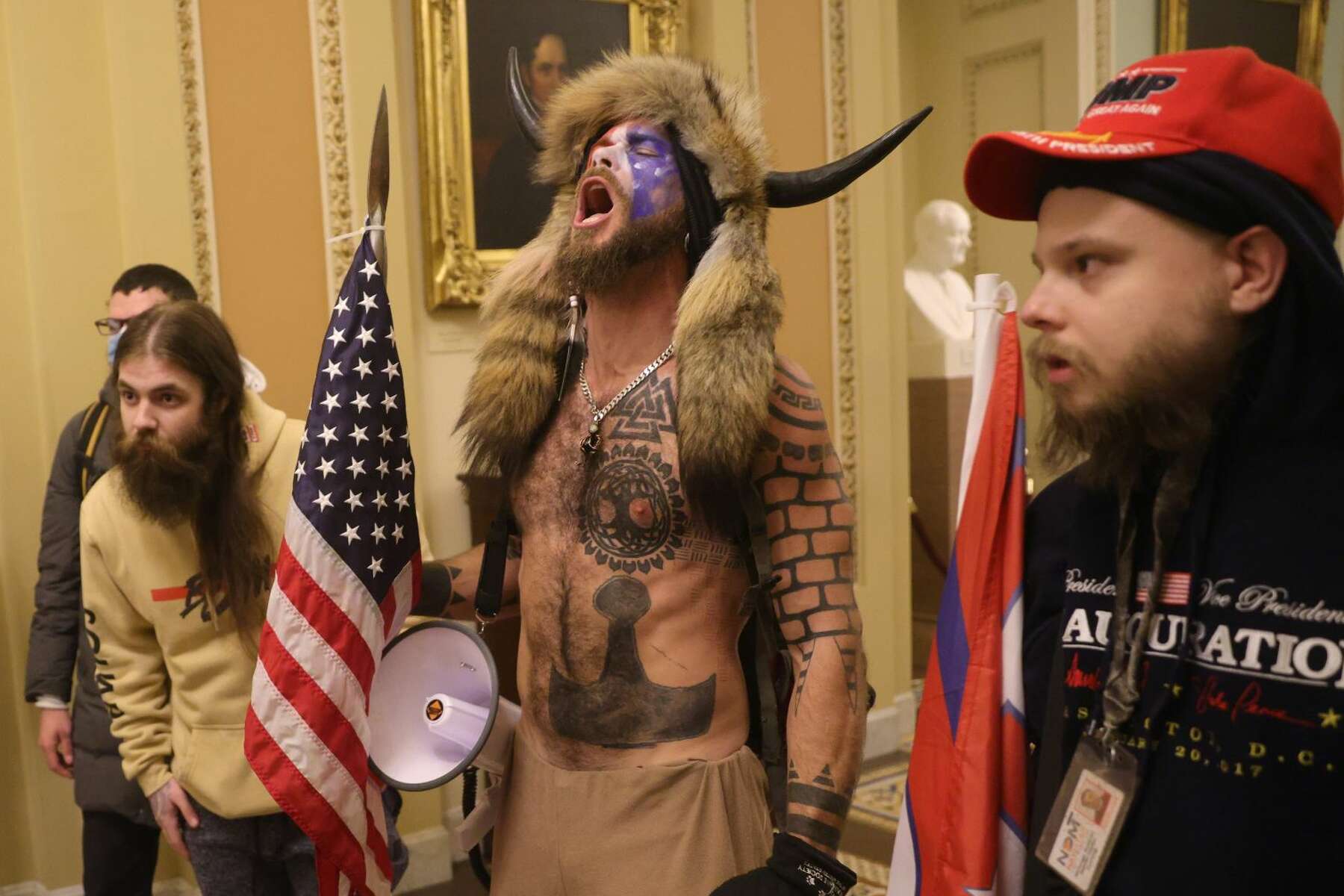 Fact check: Face-painted man in horned 