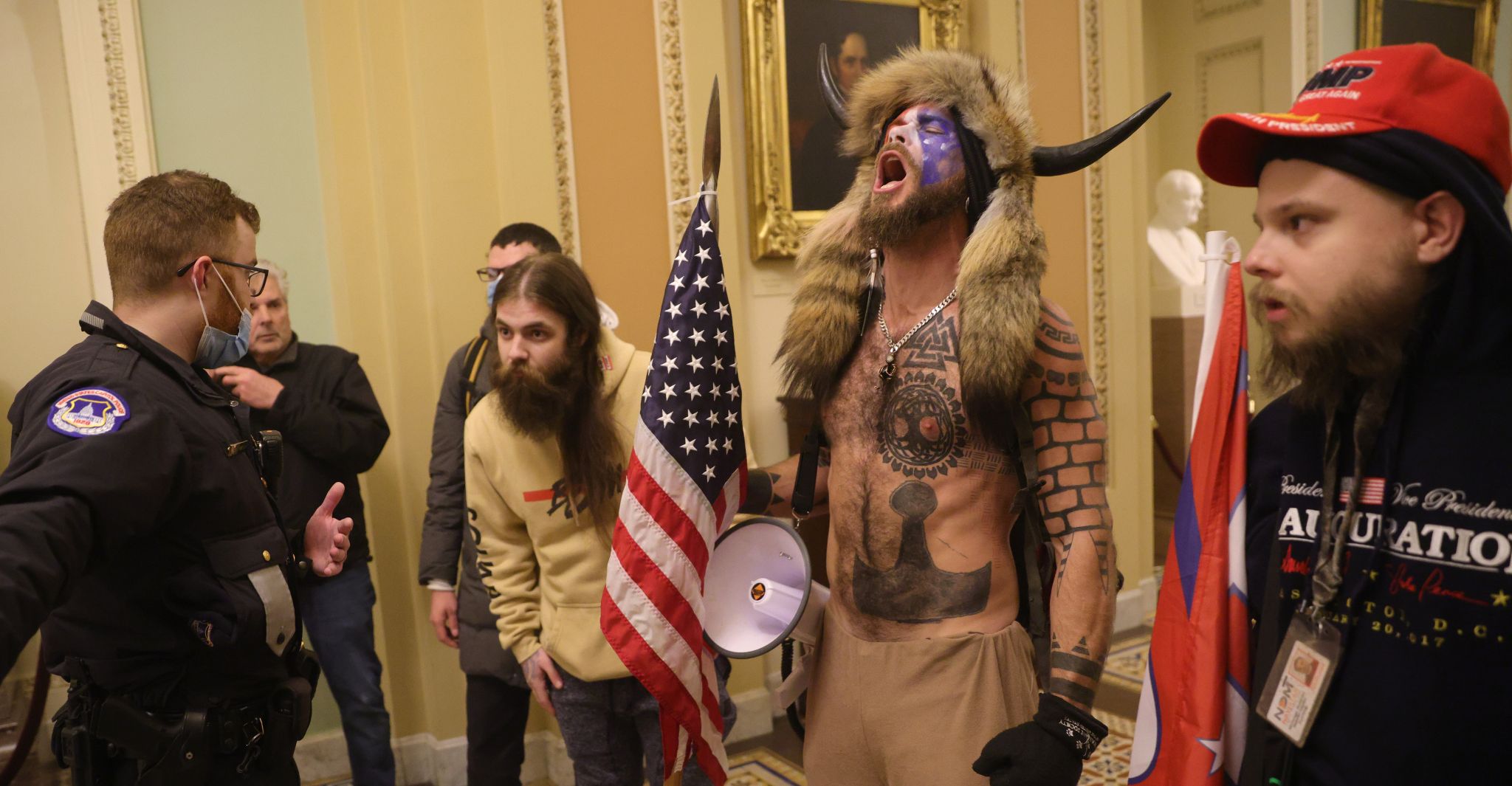 Fact check: Face-painted man with a horn peel on Capitol riot supports Trump and QAnon, not antifa
