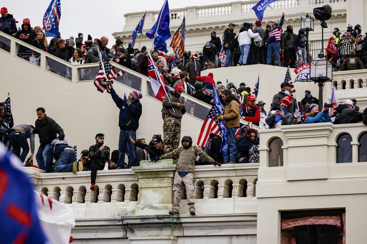 Pro-Trump supporters storm the U.S. Capitol following a rally with President Donald Trump on Wednesday, Jan. 6, 2021 in Washington, D.C.