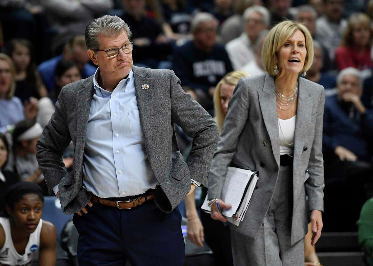 Connecticut head coach Geno Auriemma and associate head coach Chris Dailey, right, during the second half of a second-round women's college basketball game in the NCAA tournament, Sunday, March 24, 2019, in Storrs, Conn. (AP Photo/Jessica Hill)