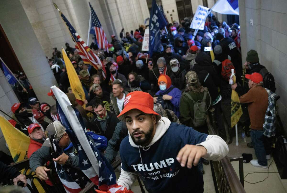Incited by President Donald Trump, a mob — made up of the same people who criticize athletes who peacefully take a knee — breaks into the U.S. Capitol on Wednesday. History will judge them harshly, and it will catch up to Trump.