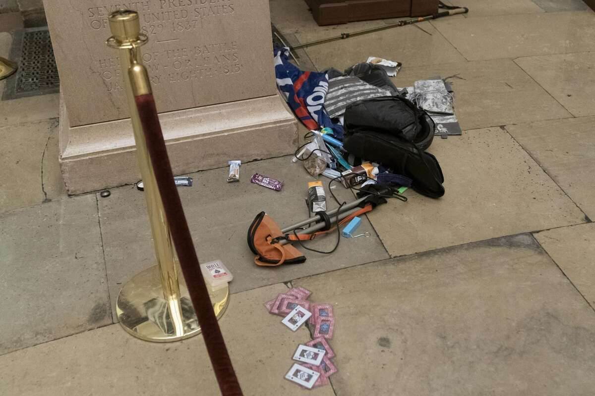 Debris and personal belongings are strewn across the floor of the Rotunda in the early morning hours after protesters stormed the Capitol on Wednesday in Washington, Thursday, Jan. 7, 2021. (AP Photo/Andrew Harnik)