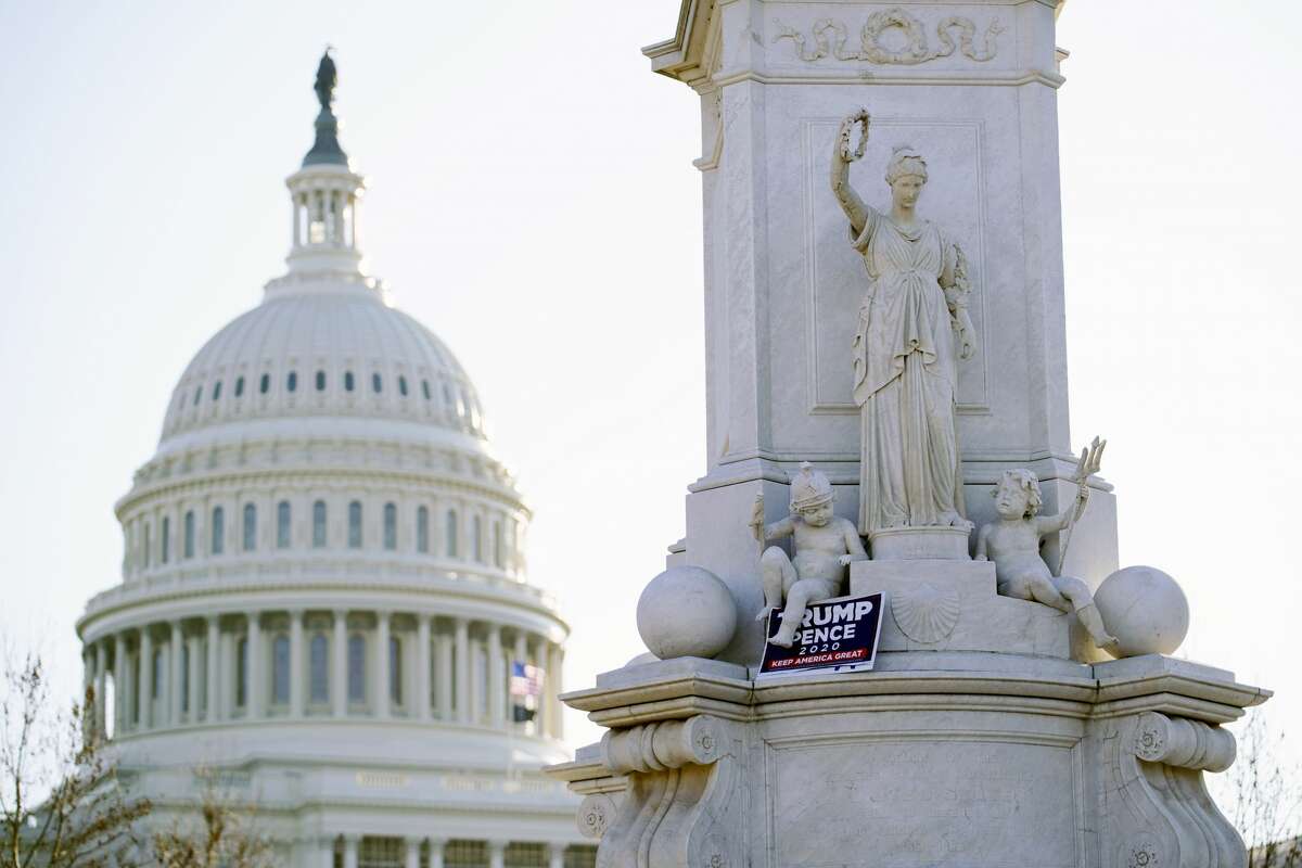 FILE. Letter writer says the Congress members who denied the electoral college results should resign, saying 'their assault on the very essence of democracy makes them no better than the anarchists and thugs who violently wreaked havoc on the Capitol.' (AP Photo/Matt Slocum)