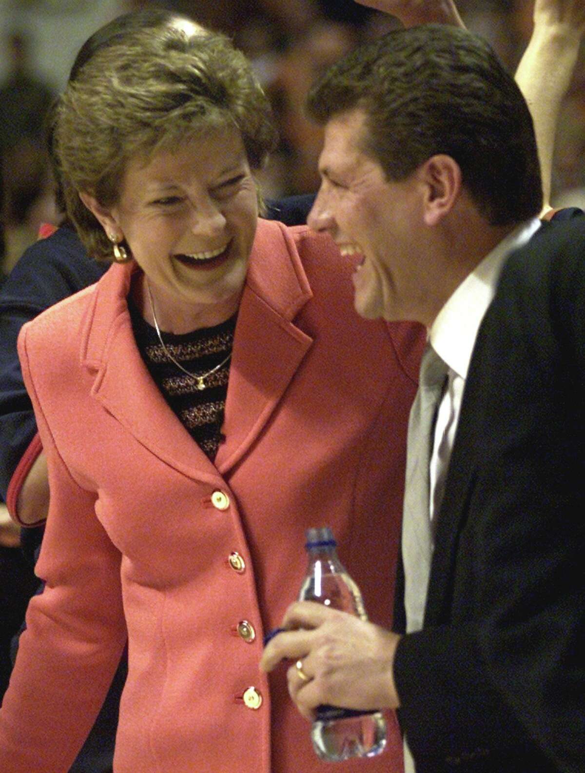 Tennessee head coach Pat Summitt, left, and Connecticut's Geno Auriemma share a laugh before their game Saturday, Jan. 5, 2002 in Knoxville, Tenn. Connecticut defeated Tennessee 86-72.(AP Photo/Wade Payne) HOUCHRON CAPTION (03/31/2002-2-STAR): Tennessee's Pat Summitt, left, and Connecticut's Geno Auriemma show that success in coaching women's college basketball comes in both genders. What they haven't always shared is a warm relationship.