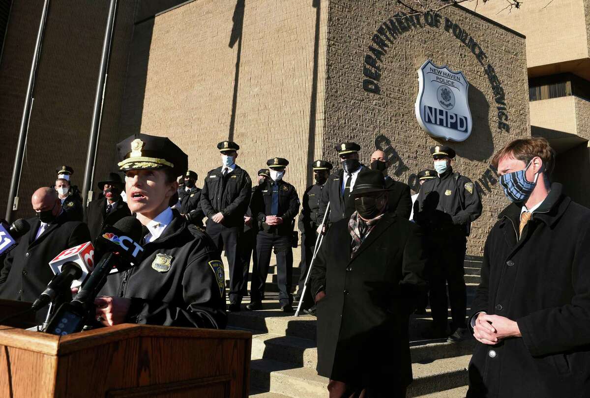 Assistant Chief Renee Dominguez, left, speaks in front of the New Haven Police Department on January 7, 2021, after her appointment was announced by Mayor Justin Elicker as the incoming acting chief of the New Haven Police Department.