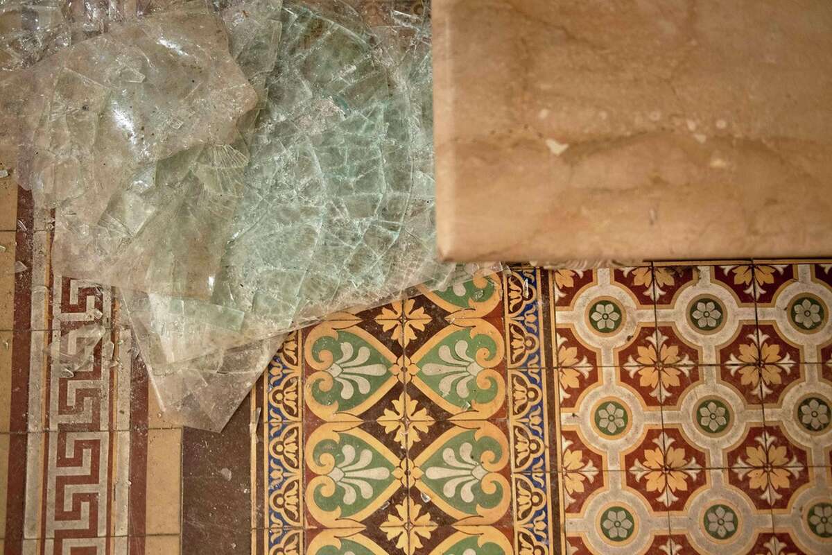 Damage is seen near a breached window in the House of Representatives a day after a pro-Trump mob broke into the US Capitol on January 7, 2021, in Washington, DC. (Photo by Brendan Smialowski / AFP)