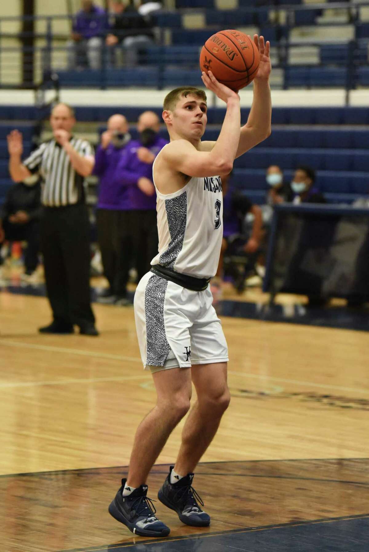 Kingwood point guard Billy Gould driving the basket to make a play for the Mustangs in a District 21-6A game agaisnt Humble at the Mustangs gym.