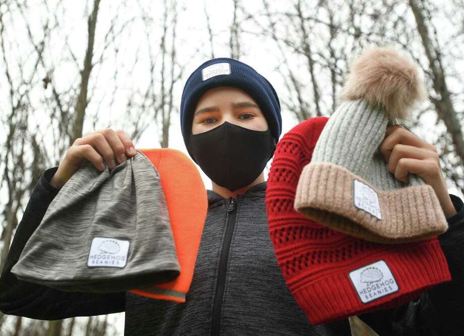Cooper Schwartz, 14, of Guilford, donates to the homeless with every one of his Hedgehog Beanies sold from his hedgehogbeanies.com website on Thursday, December 31, 2020. Photo: Brian A. Pounds / Hearst Connecticut Media / Connecticut Post