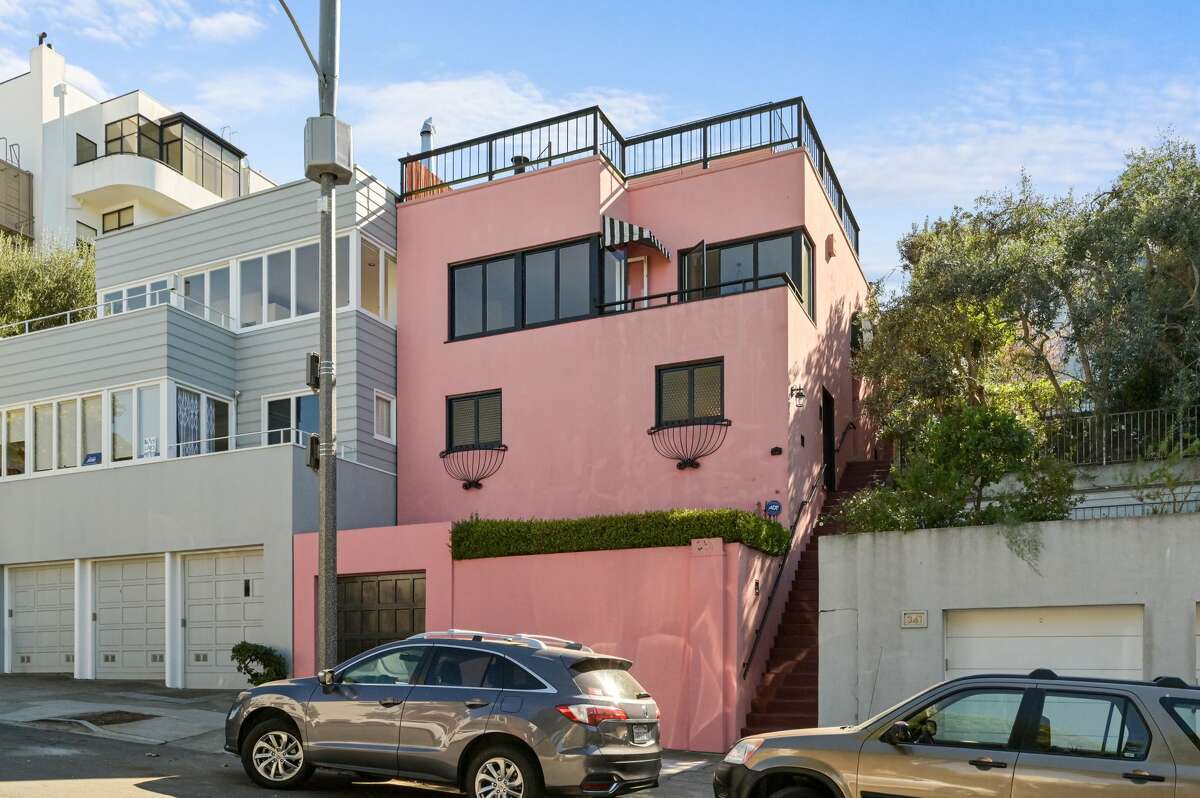 The pink abode has tons of curb appeal, standing out from its neighbors on Telegraph Hill. 