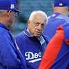 FILE - JANUARY 8, 2021: It was reported that Tommy Lasorda, the former manager of the Los Angeles Dodgers has died at the age of 93 January 8, 2021. CHICAGO, IL - OCTOBER 17: Former Los Angeles Dodgers manager Tommy Lasorda (C) and manager Joe Maddon of the Chicago Cubs meet before game three of the National League Championship Series at Wrigley Field on October 17, 2017 in Chicago, Illinois.